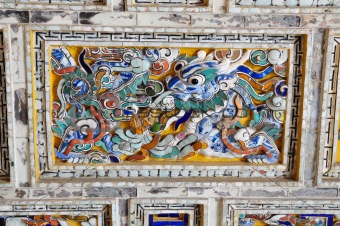 detail of the roof of a Emperor palace in Hue, Vietnam