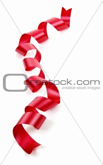 Curled red holiday ribbon