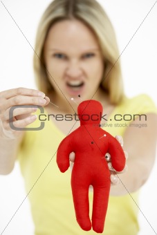 Woman Holding Voodoo Doll