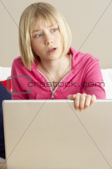 Worried Looking Girl Using Laptop