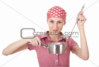 Housewife in headscarf with ladle and pan