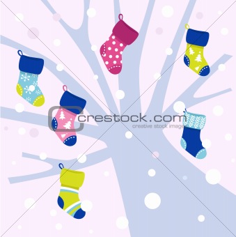 Christmas socks on winter tree, snowing behind - vector


