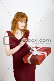 beautiful sexy woman eith christmas present