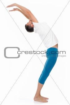 young man practising yoga postures combination suri namaskar