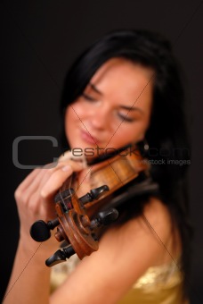 beautiful woman playing the violin