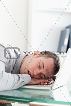 Overworked businessman taking a nap
