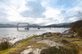 Three fishing boats on a Scottish Loch
