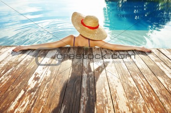Woman at poolside