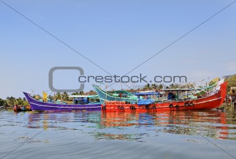 Colorful fishing boats moored at Kochin Backwater
