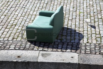 Sofa on cobblestone
