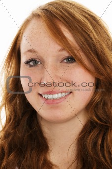 portrait of a young smiling redhead woman
