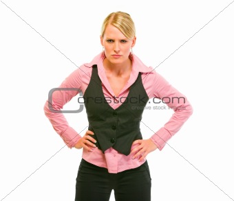 Angry business woman with hands of hips
