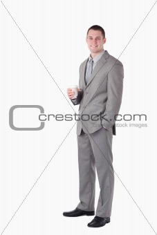 Portrait of a businessman holding a cup of coffee