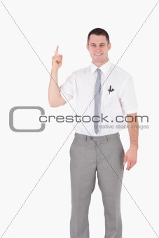 Portrait of an office worker pointing at something