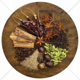 Mixed Spices on a Wooden Chopping Board