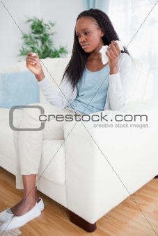 Woman checking her temperature