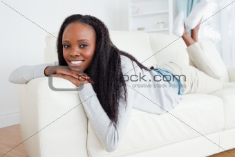 Woman having a moment of relaxation on sofa