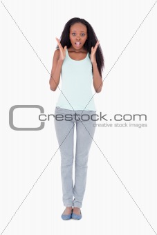 Surprised woman on white background