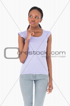 Close up of woman thinking on white background
