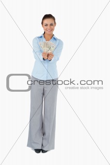 Businesswoman presenting banknotes