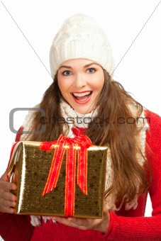 Beautiful woman holding christmas present