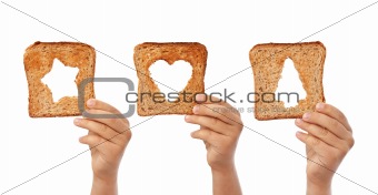 Bread slices with christmas symbols cutouts