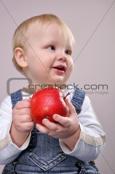 baby boy with an apple