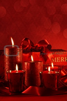Christmas candles on a red background 