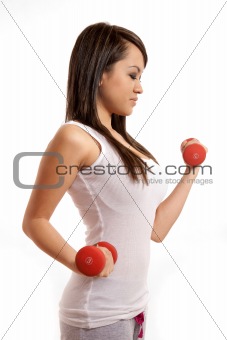 Attractive asian filipina woman lifting weights