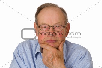 Male senior holding his chin