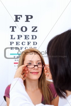 Woman buying glasses
