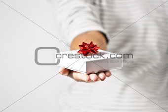 Young Woman Offering a Gift