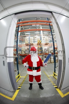 santa claus manager in storehouse