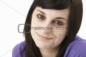 Studio Portrait Of Smiling Teenage Girl