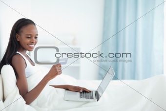 Young woman shopping online