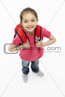 Studio Portrait of Smiling Girl Wearing School Bag