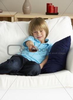 Young Boy Watching Television at Home