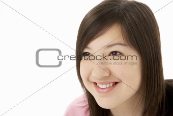 Studio Portrait of Smiling Teenage Girl
