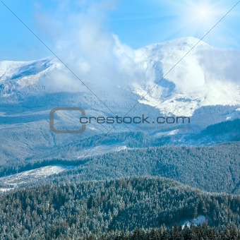 Morning cloudy winter mountain landscape.