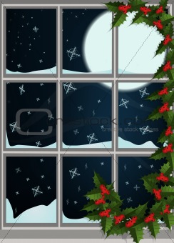 Winter window decorated with leaves and berries, snowfall and moonlight outside