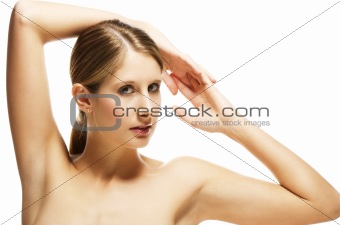 beautiful young blonde woman holding arms over her head
