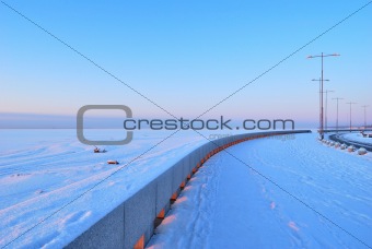 Quay on the shore of the Gulf of Finland in St. Petersburg at dawn