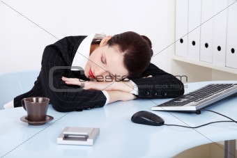 Sleeping businesswoman.