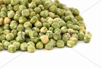 Close up view of scattered dried green pea on white background