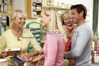 Female sales assistant in health food store