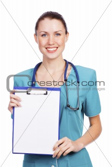 Cute nurse shows a blank paper sheet on clipboard