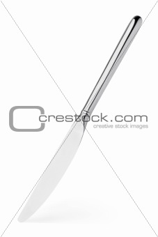 Silver knife stands vertically isolated on white