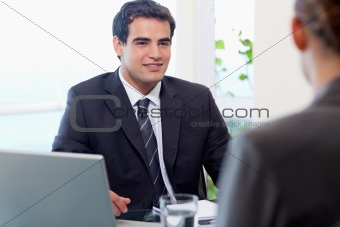 Young manager interviewing a female applicant