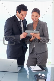 Trades partner looking at tablet in their hands