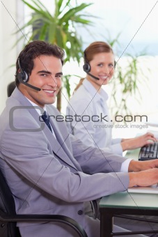 Side view of call center agents